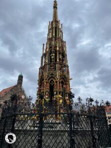 The Schoene Bruennen, or the beautiful fountain in English, locate in the center of the Altstadt in Nuremburg.