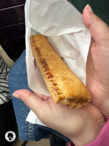Dishes to try in Scotland - Image of a sausage roll.  a Pastry roll filled with mildly spiced ground beef, or a ground beef and pork mixture. 