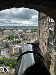 View of the Edinburgh city through a canon portal