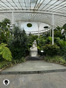 Statue in courtyard inside the Greenhouse at the Botanic Gardens in Glasgow