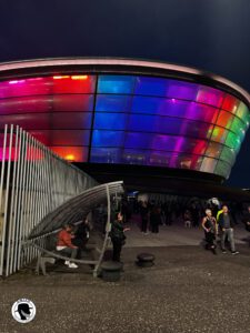 Colorful illumination of the OVO Hydro at night.